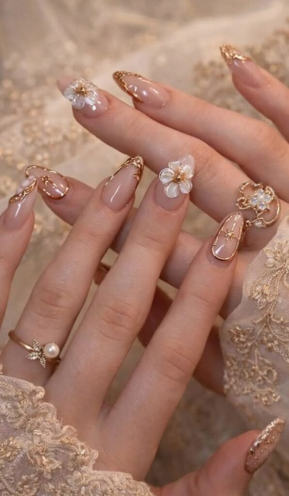 A woman showing off her perfectly done acrylic nails in a salon