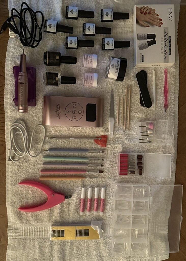 Acrylic nails at home starter kit including acrylic powder brush and nail tips
