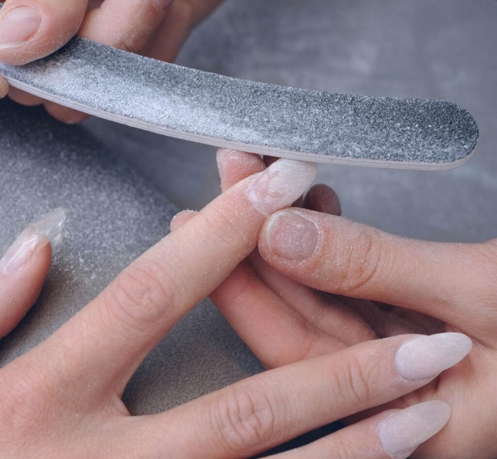 Final step acrylic nails smoothing buffing and glossy finish