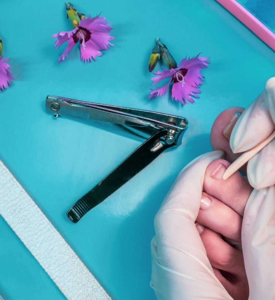 Preparing natural nails and attaching nail tips for acrylic extensions