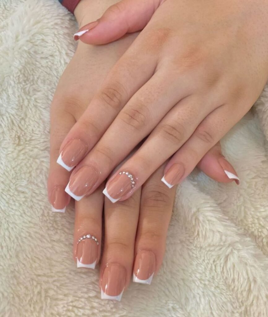 short oval acrylic nails with marble effect and pink ombre gradient design