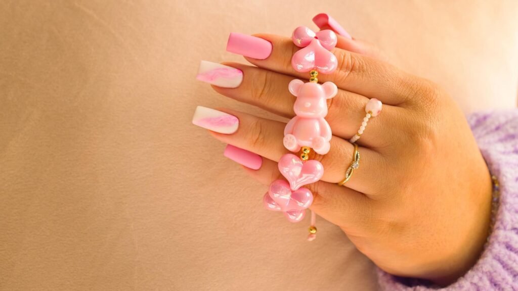 trendy pink and white ombre acrylic nails with glitter